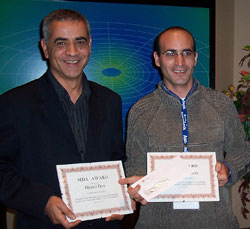 Le professeur Djemel Ziou et Mohand Sad Allili, doctorant en informatique.