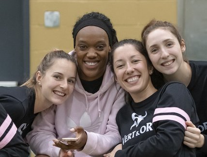 Groupe d'athlètes du vert et or