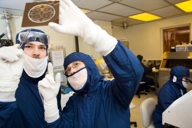 Photo of two people working together in a laboratory